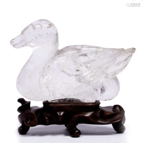 Rock crystal carving of a recumbent duck Chinese, 19th Century on fitted wood stand carved as