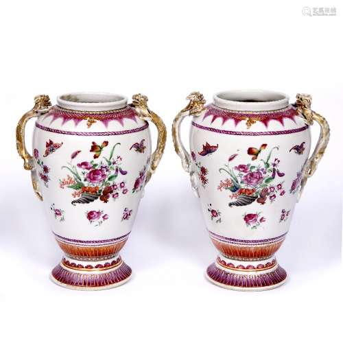Pair of famille rose vases Chinese, late 18th Century each with cornucopia of flowers and insects