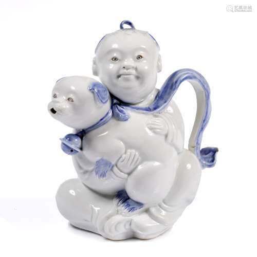 Hirado blue and white porcelain teapot Japanese, 19th Century in the form of a boy holding a puppy