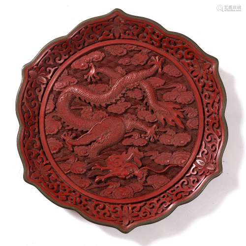 Red cinnabar lacquered plate Chinese, 19th/20th century decorated with a five clawed dragon within a