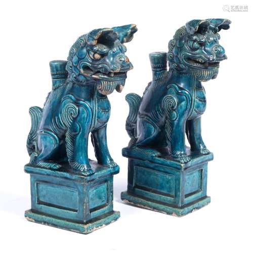 Pair of turquoise pottery temple guardians Chinese, 19th Century the kneeling figures in the Ming