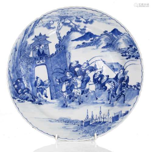Blue and white plate Chinese, early 19th Century depicting several figures on horseback in a