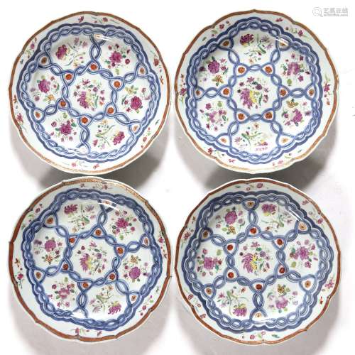 Set of four famille rose plates Chinese, Qianlong with blue ribbon panels of flowers 22.5cm