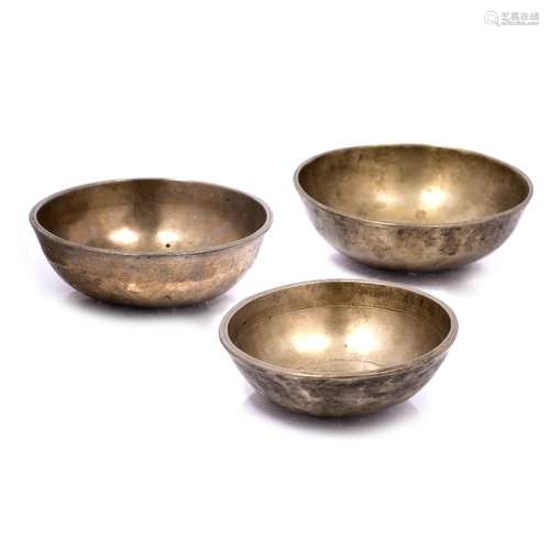 Set of three singing bowls Nepalese largest 16cm across (3)