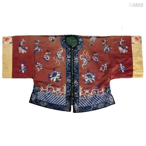 Silk embroidered coat Chinese, circa 1920/30 with phoenix, fruit and flowers with blue borders