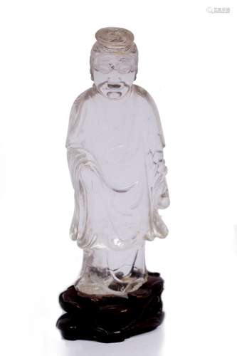 Rock crystal figure of Guanyin Chinese, 19th Century standing looking outwards while supporting