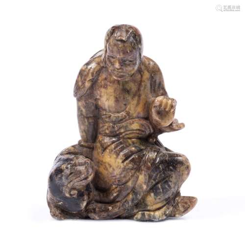 Soapstone figure of Luohan Chinese, Qing dynasty seated on a mythological animal 7.8cm high x 6.
