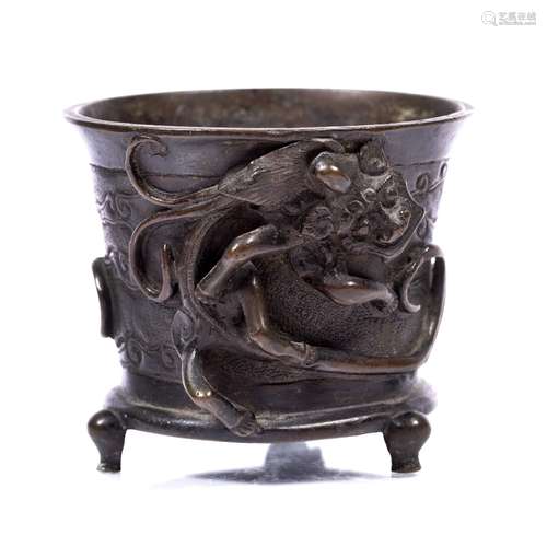 Bronze censer Chinese, 17th century cast with exterior dragons, supported on three legs 11cm wide