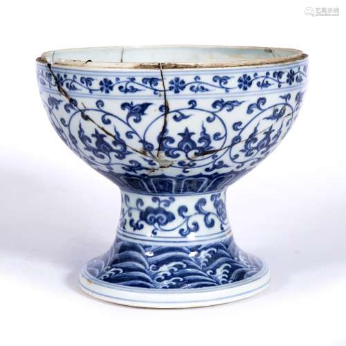 Blue and white porcelain pedestal bowl Chinese, 17th/18th Century with wave and trailing foliage,