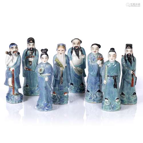 Set of eight Immortals Chinese, early 20th Century each with robin's-egg glaze and painted