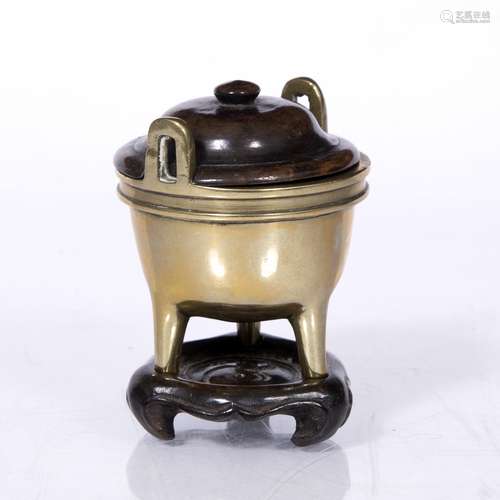 Miniature bronze censer Chinese, 19th Century with hardwood cover and stand, carved with Yin/Yang