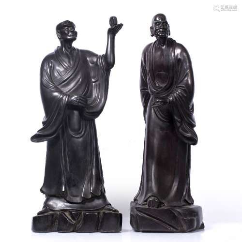 Zitan wood sculptures of standing Louhans 19th Century standing up on rocky boxes, one holding a