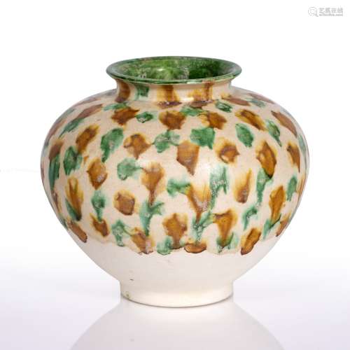 Sancai globular jar Chinese, Tang Dynasty the body decorated with spaced and entwined daubs, the