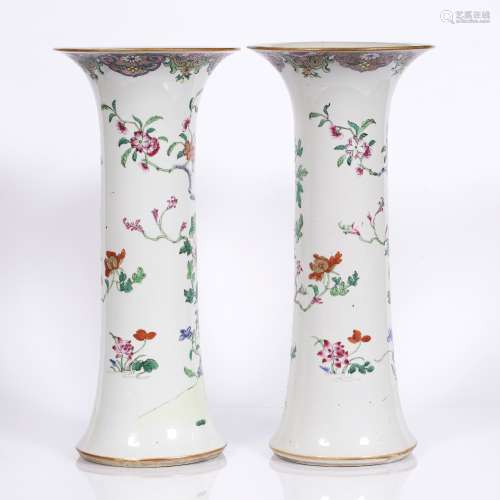 Pair of famille rose ku shaped vases Chinese, 18th/19th Century painted with phoenix, rockwork and