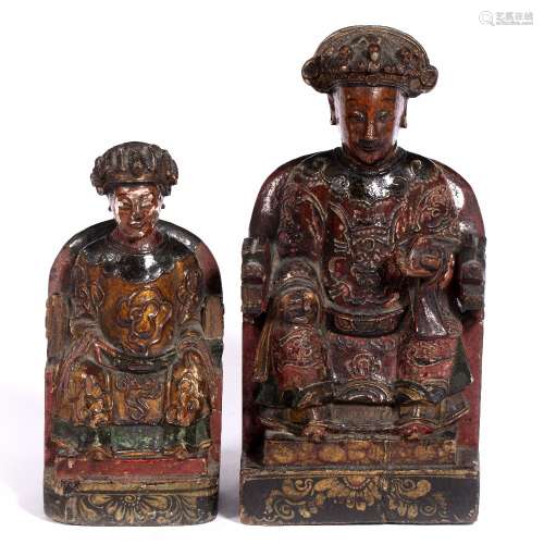 Carved and lacquered Emperor figure Chinese, late 17th Century 30cm high and a smaller model