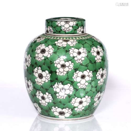 Ginger jar Chinese, 19th century decorated with peonies, of green ground 26cm high