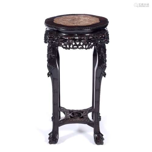 Hardwood stand Chinese, 19th century the top inset with marble, and having a carved frieze 80cm