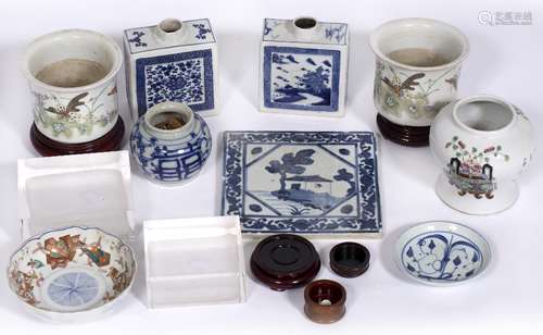 Group of Chinese and Japanese porcelain pieces to include a tile, jardiniere and other items