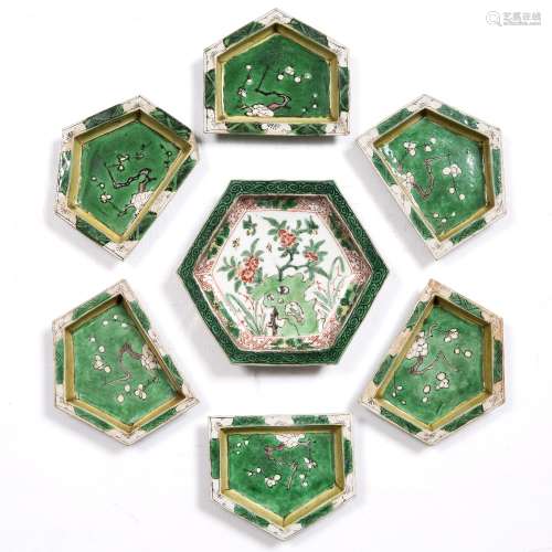 Porcelain octagonal dish Chinese, Kangxi (1662-1722) painted with rockwork and flowers within an