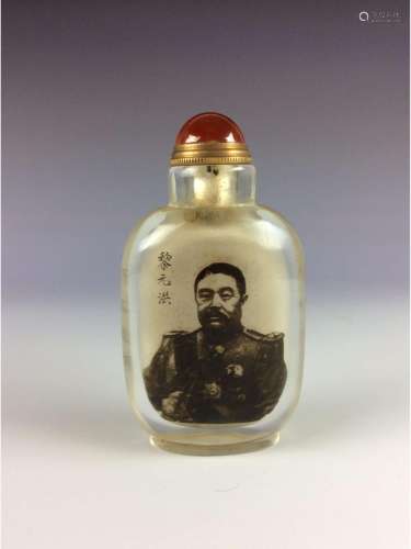 Chinese glass snuffle bottle with cap and spoon.