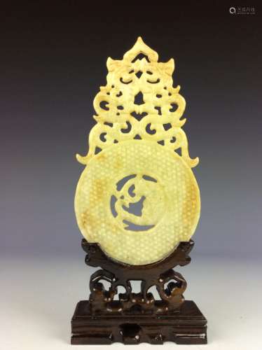 Chinese jade carved disc with decorative totem