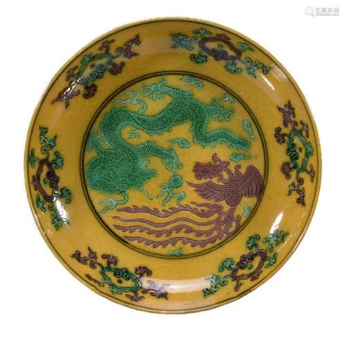 A Chinese yellow-ground green and aubergine enamelled