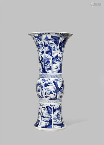 *A CHINESE BLUE AND WHITE GU-SHAPED VASE