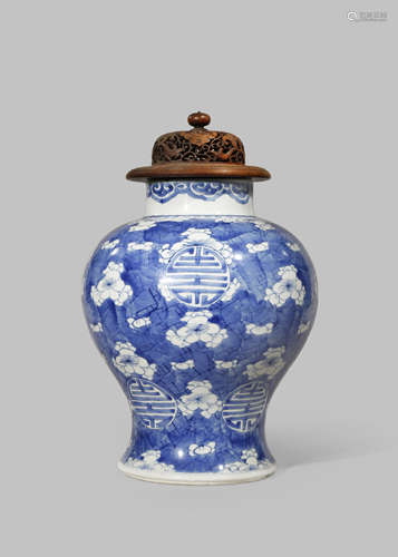 A CHINESE BLUE AND WHITE 'PRUNUS' VASE