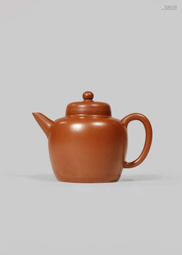 A SMALL CHINESE YIXING TEAPOT AND COVER