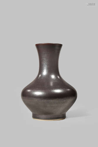 A CHINESE IRON-RUST GLAZED VASE