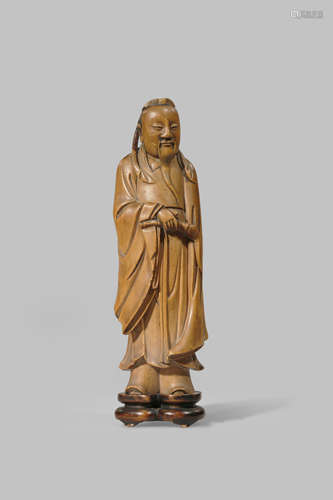 A CHINESE BOXWOOD FIGURE OF AN IMMORTAL