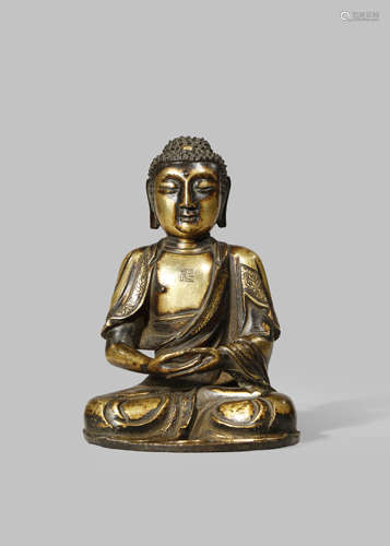 A CHINESE GILT-BRONZE FIGURE OF BUDDHA SHAKYAMUNI