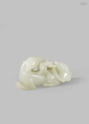 A CHINESE PALE CELADON JADE CARVING OF A DOG AND A PUPPY