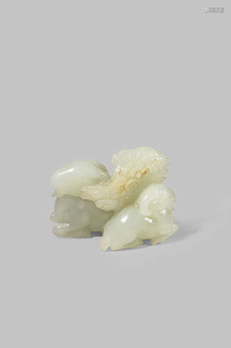 A CHINESE PALE CELADON JADE MODEL OF TWO GOATS