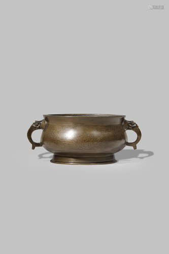 A CHINESE SILVER INLAID 'SHI SOU' BRONZE INCENSE BURNER