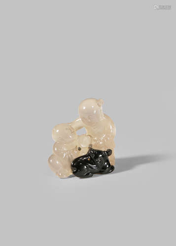 A CHINESE AGATE CARVING OF TWO BOYS