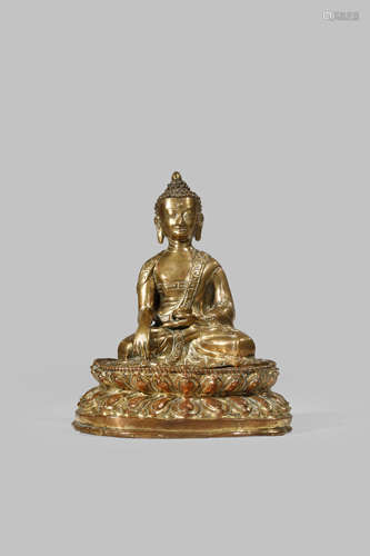 A CHINESE GILT-COPPER FIGURE OF BUDDHA SHAKYAMUNI