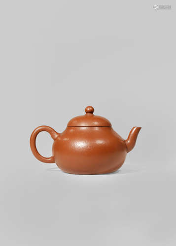 A CHINESE YIXING TEAPOT AND COVER