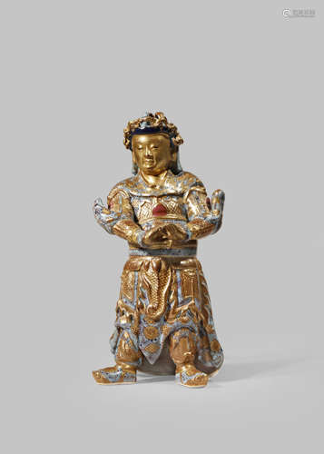 A CHINESE ROBIN'S EGG GLAZED AND GILDED FIGURE OF A GENERAL