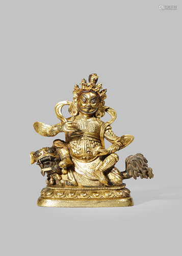 A TIBETAN GILT-BRONZE FIGURE OF VAISHRAVANA