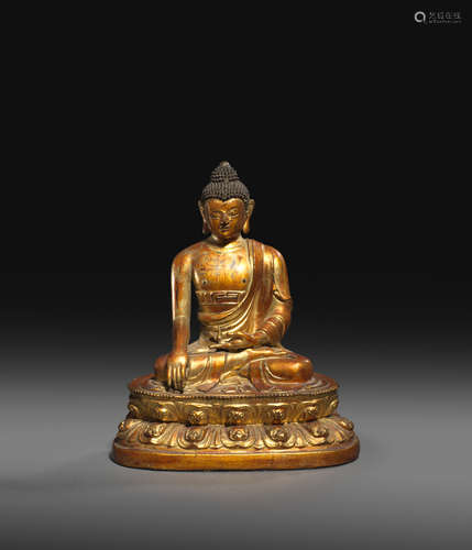 A RARE CHINESE GILT-WOOD FIGURE OF BUDDHA SHAKYAMUNI