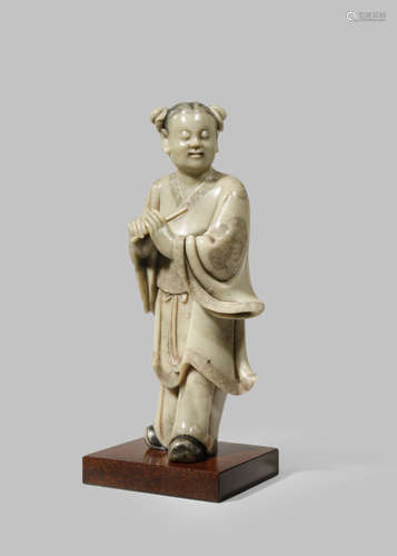 A CHINESE SOAPSTONE FIGURE OF HAN XIANG ZI