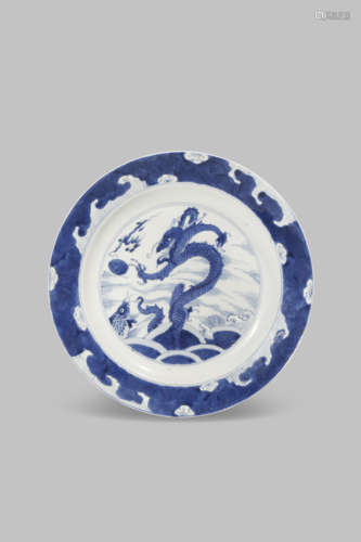 A CHINESE BLUE AND WHITE 'WATER DRAGON' DISH