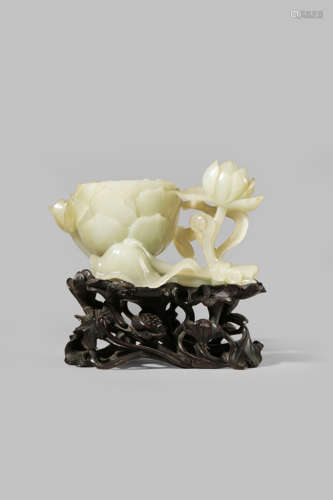 A CHINESE  WHITE JADE LOTUS WATER POT