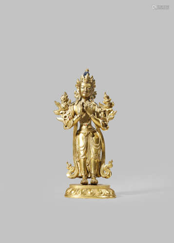 A TIBETO-CHINESE GILT-BRONZE SCULPTURE OF MAITREYA