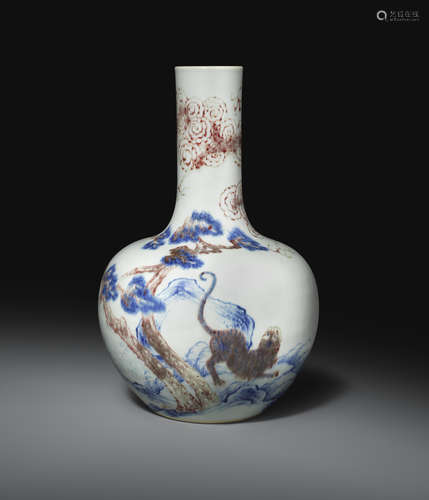 A RARE CHINESE BLUE AND WHITE AND UNDERGLAZE RED 'DRAGON AND TIGER' BOTTLE VASE