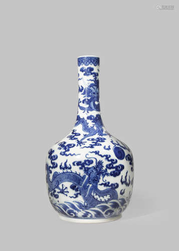 A CHINESE BLUE AND WHITE 'DRAGON' BOTTLE VASE