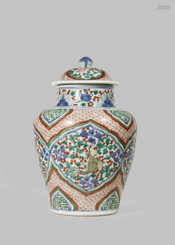 A CHINESE WUCAI JAR AND COVER