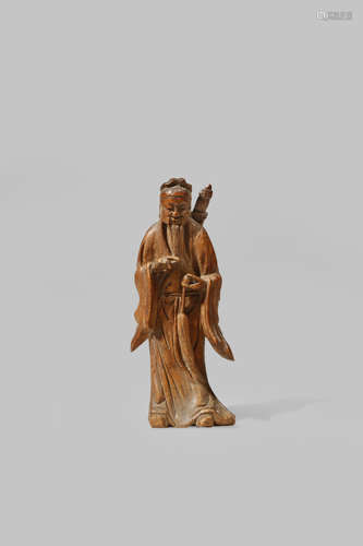 A SMALL CHINESE BAMBOO FIGURE OF LU DONG BIN