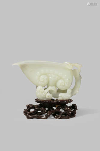 A CHINESE WHITE JADE 'LINGZHI' LIBATION CUP